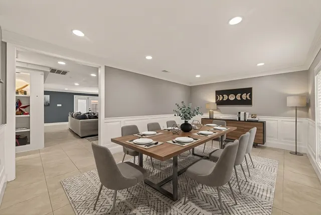 a view of a dining room with furniture