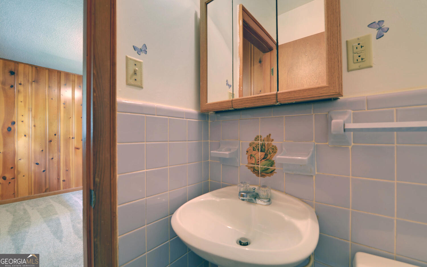 586 Collins Road Toccoa, GA 30577 - Photo 17 of 52 a bathroom with a sink a toilet and a mirror