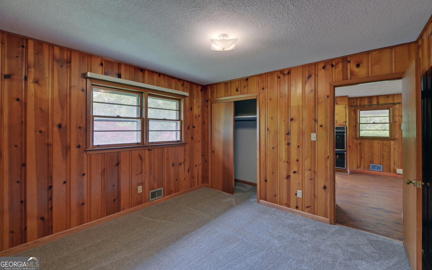 586 Collins Road Toccoa, GA 30577 - Photo 25 of 52 an empty room with closet area