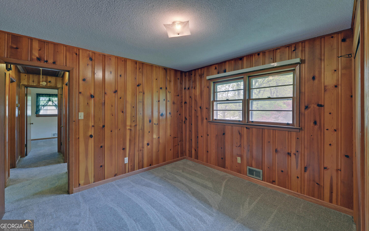 586 Collins Road Toccoa, GA 30577 - Photo 27 of 52 wooden floor and windows in a room