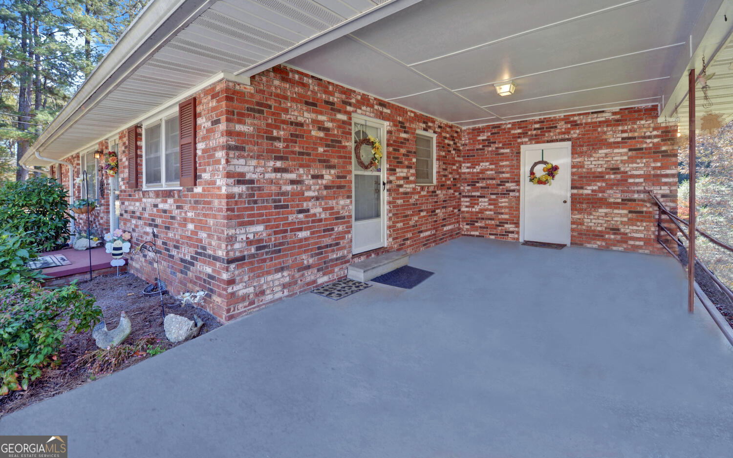 586 Collins Road Toccoa, GA 30577 - Photo 4 of 52 a view of an empty room with a balcony