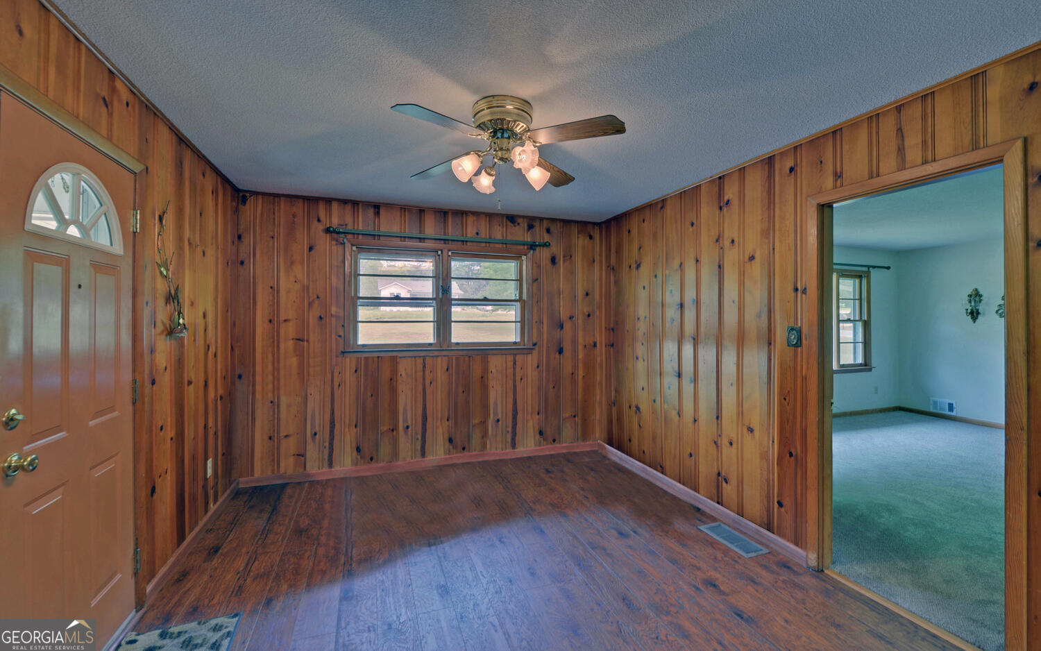 586 Collins Road Toccoa, GA 30577 - Photo 10 of 52 wooden floor in an empty room with a window