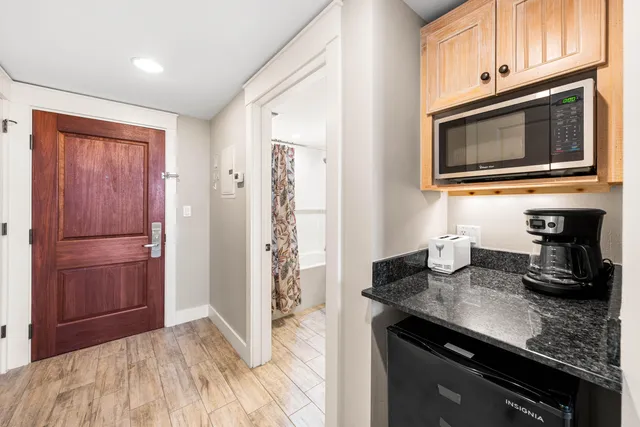 a view of a swimming pool with a yard