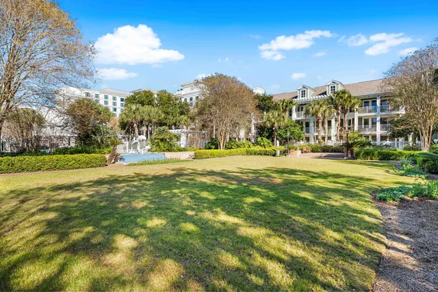 a group of people sitting outside of a building