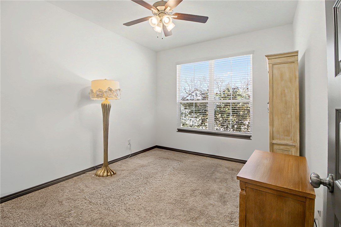 2406 Lightfoot Lane Bryan, TX 77803 - Photo 25 of 38 an empty room with windows