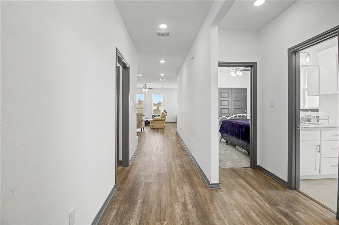 2406 Lightfoot Lane Bryan, TX 77803 - Photo 9 of 38 wooden floor in a gallery