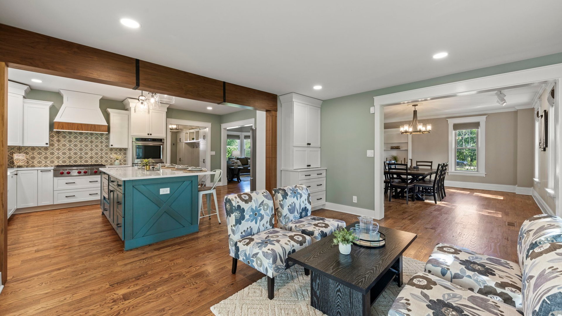 3614 Wolf Road Oswego, IL 60543 - Photo 19 of 56 a living room with furniture kitchen view and a wooden floor
