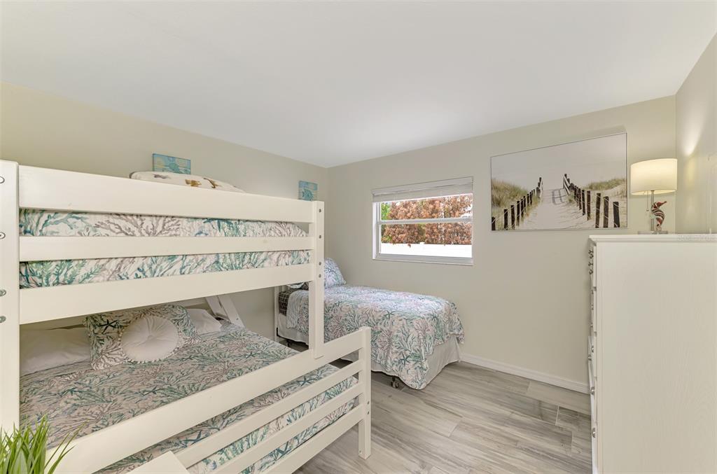 446 Canal Road, Unit 5 Sarasota, FL 34242 - Photo 19 of 64 a view of bedroom with furniture and window