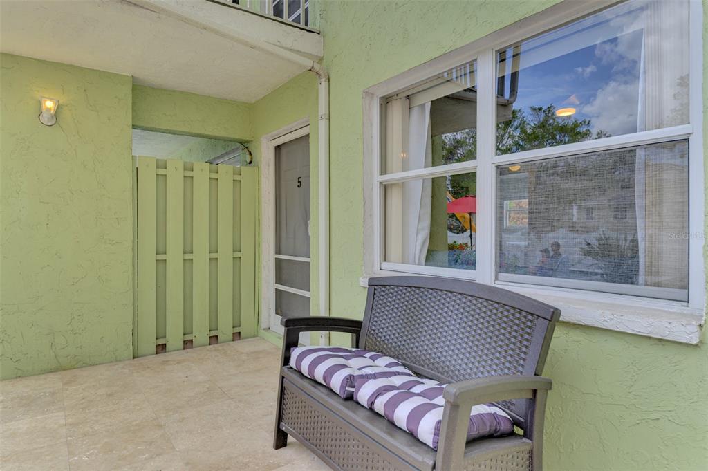 446 Canal Road, Unit 5 Sarasota, FL 34242 - Photo 3 of 64 a living room with furniture and a window