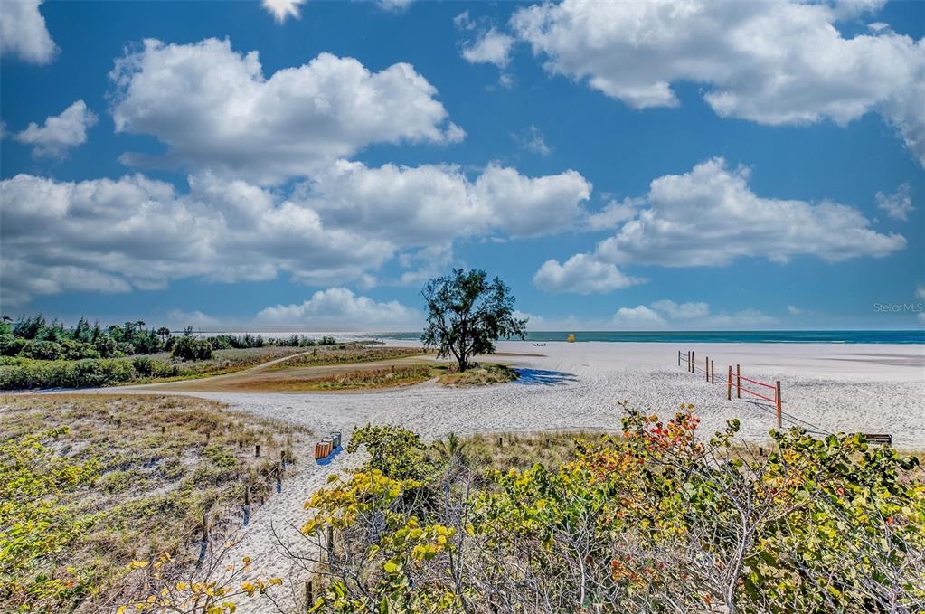 446 Canal Road, Unit 5 Sarasota, FL 34242 - Photo 38 of 64 a view of a lake with a big yard