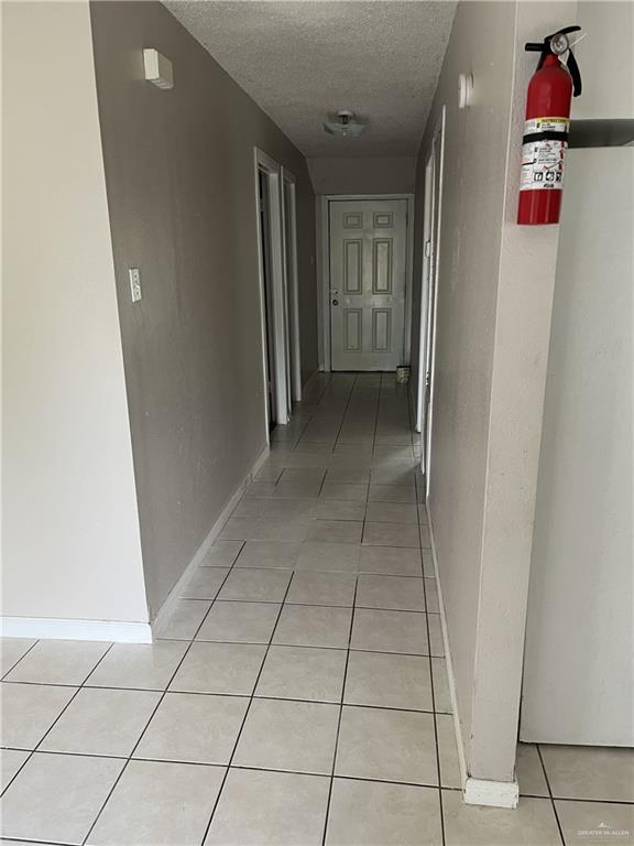 19310 North Mile 6 West Edcouch, TX 78538 - Photo 12 of 15 a view of hallway with a window and a refrigerator
