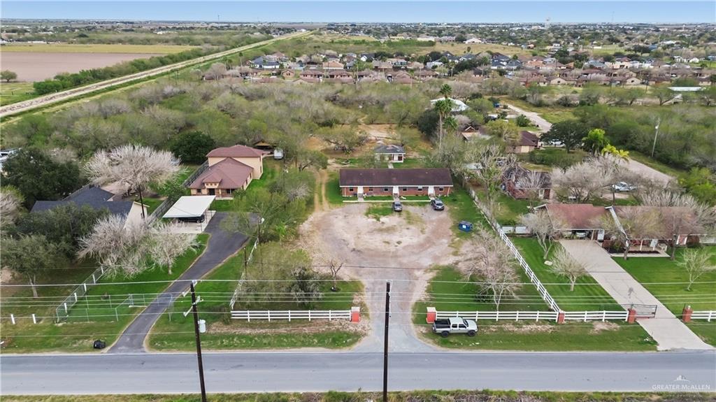 19310 North Mile 6 West Edcouch, TX 78538 - Photo 2 of 15 an aerial view of residential houses with outdoor space and river