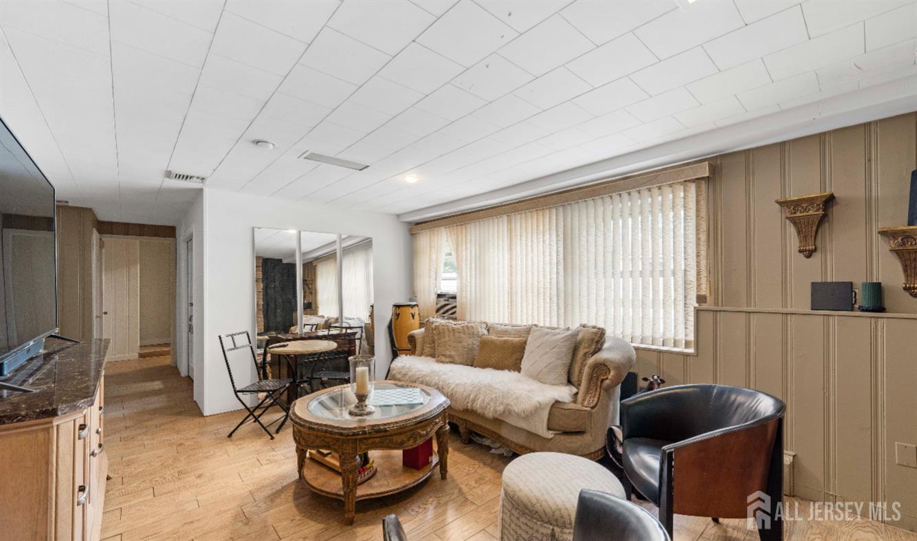 101 Weston Road Somerset, NJ 08873 - Photo 14 of 32 a living room with furniture and a window