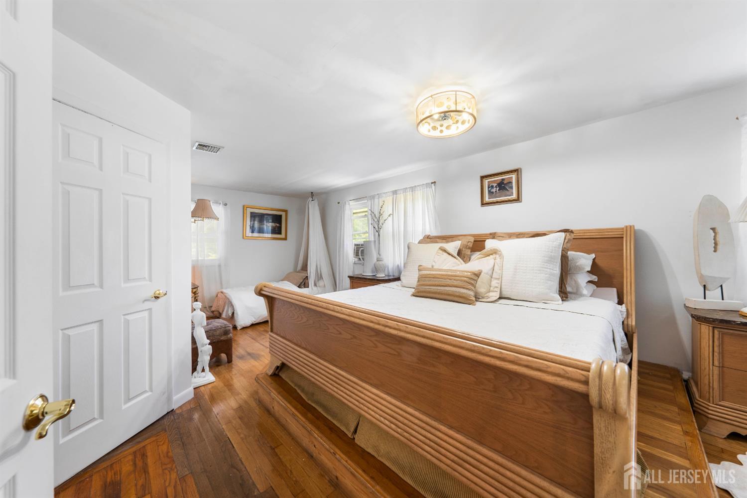 101 Weston Road Somerset, NJ 08873 - Photo 17 of 32 a bed room with bed and a window