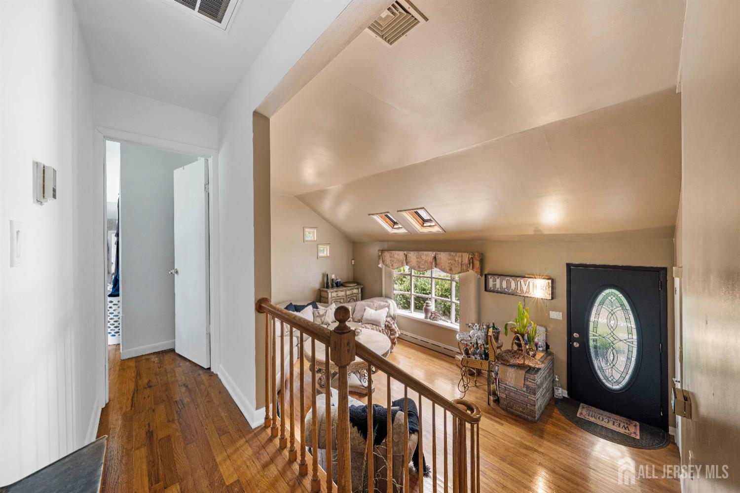101 Weston Road Somerset, NJ 08873 - Photo 18 of 32 a view of a hallway with wooden floor