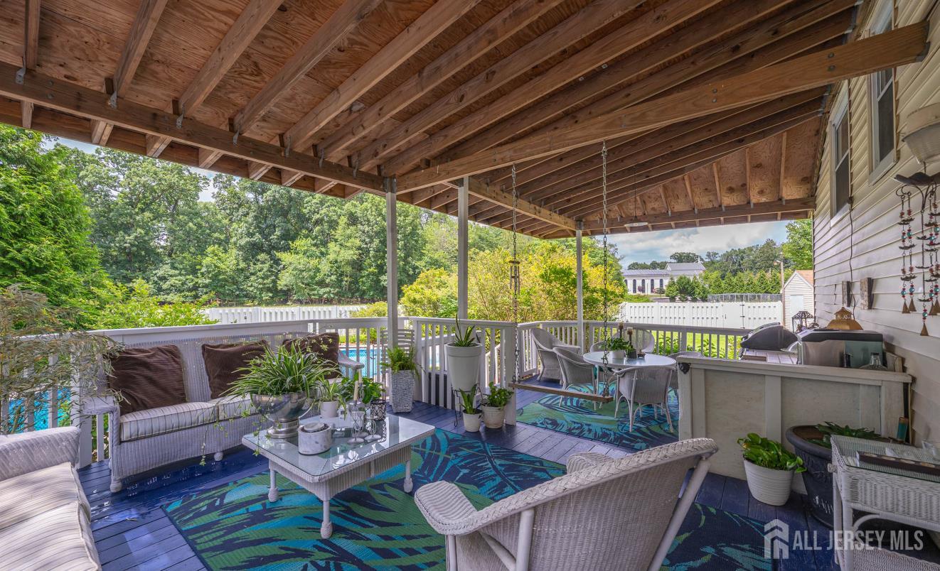 101 Weston Road Somerset, NJ 08873 - Photo 21 of 32 a outdoor living space with furniture and garden view