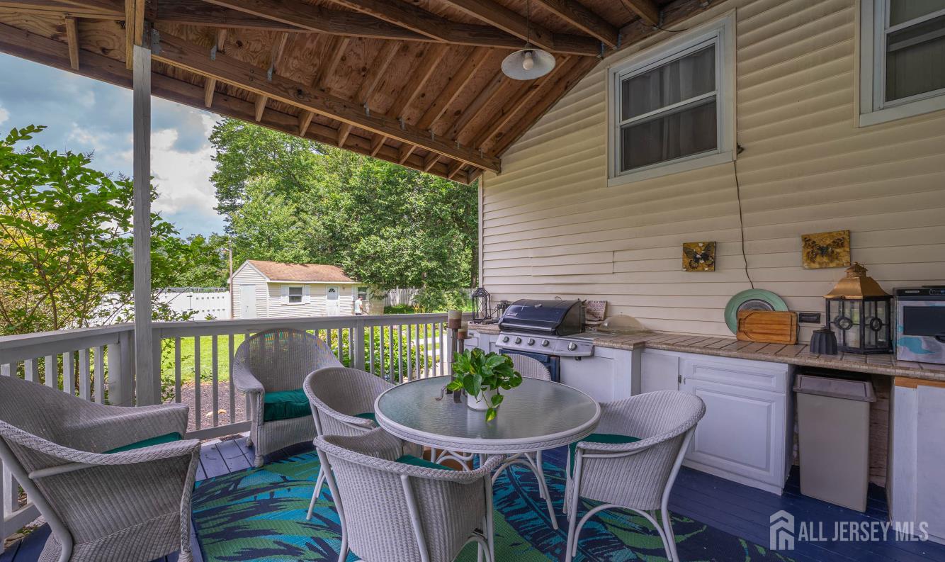 101 Weston Road Somerset, NJ 08873 - Photo 22 of 32 a view of a chairs and table in the balcony