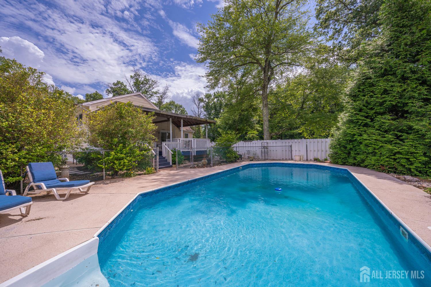 101 Weston Road Somerset, NJ 08873 - Photo 26 of 32 swimming pool view with a seating space