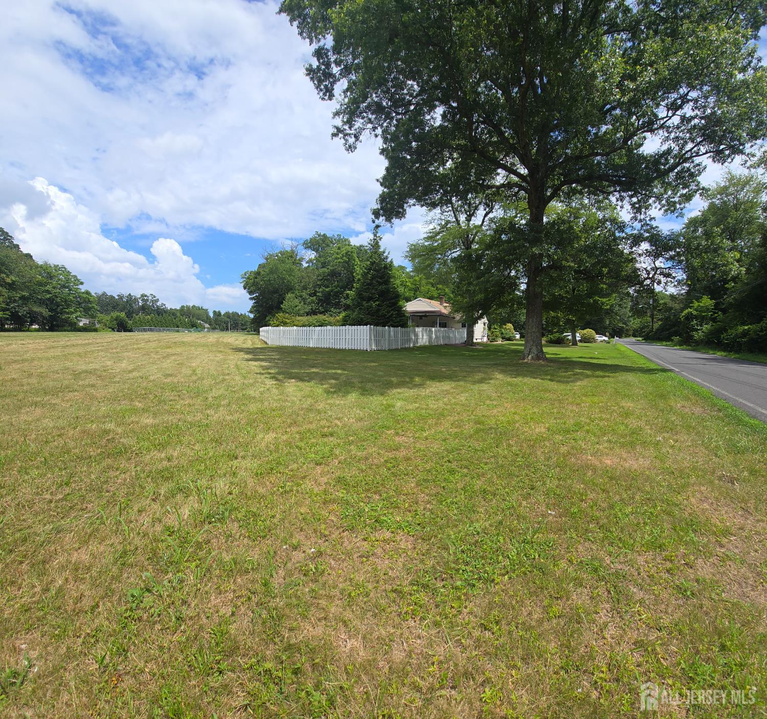 101 Weston Road Somerset, NJ 08873 - Photo 29 of 32 a view of a lake with houses in the background