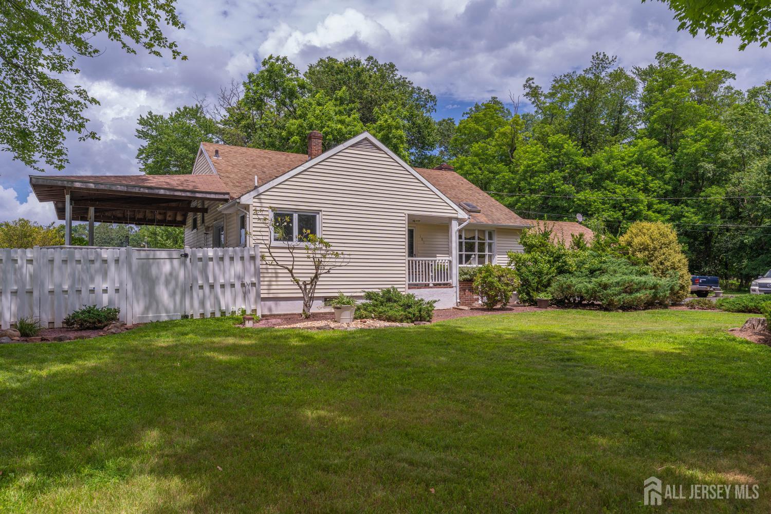 101 Weston Road Somerset, NJ 08873 - Photo 32 of 32 a backyard of a house with lots of green space