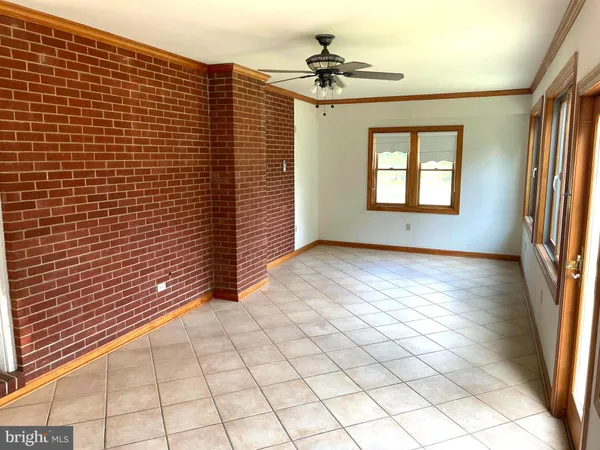 a view of an empty room and window
