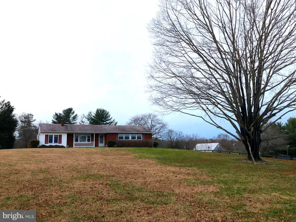 a front view of house with yard