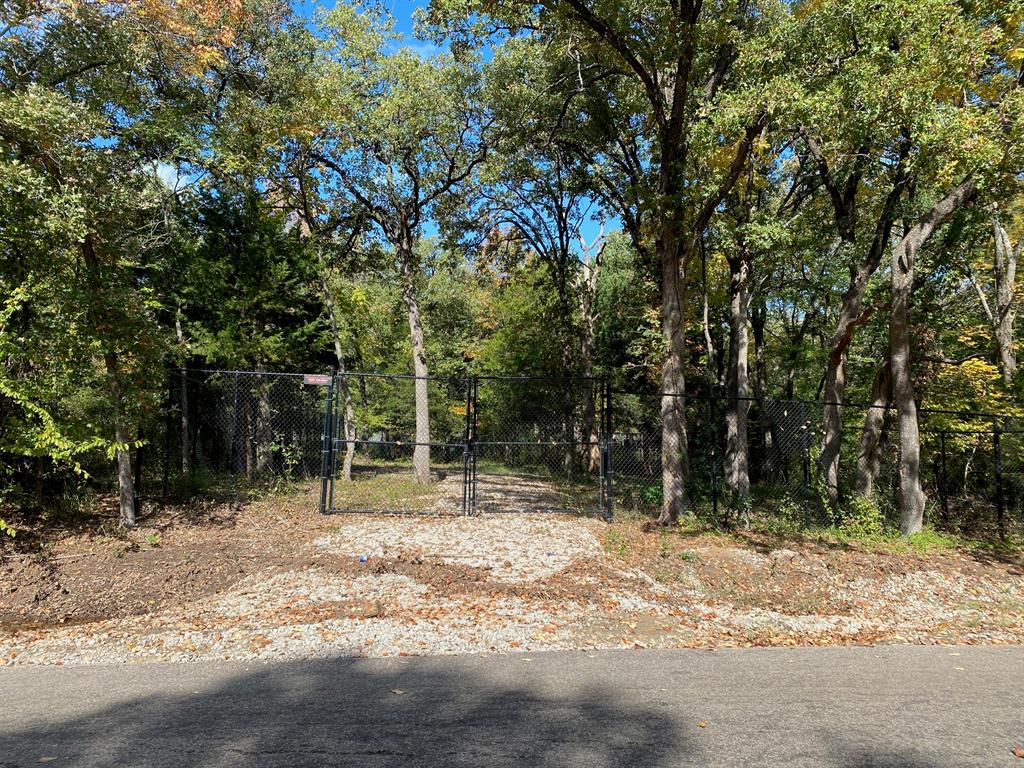 Tbd West Lane Street Quinlan, TX 75474 - Photo 1 of 1 a backyard of a house with lots of green space