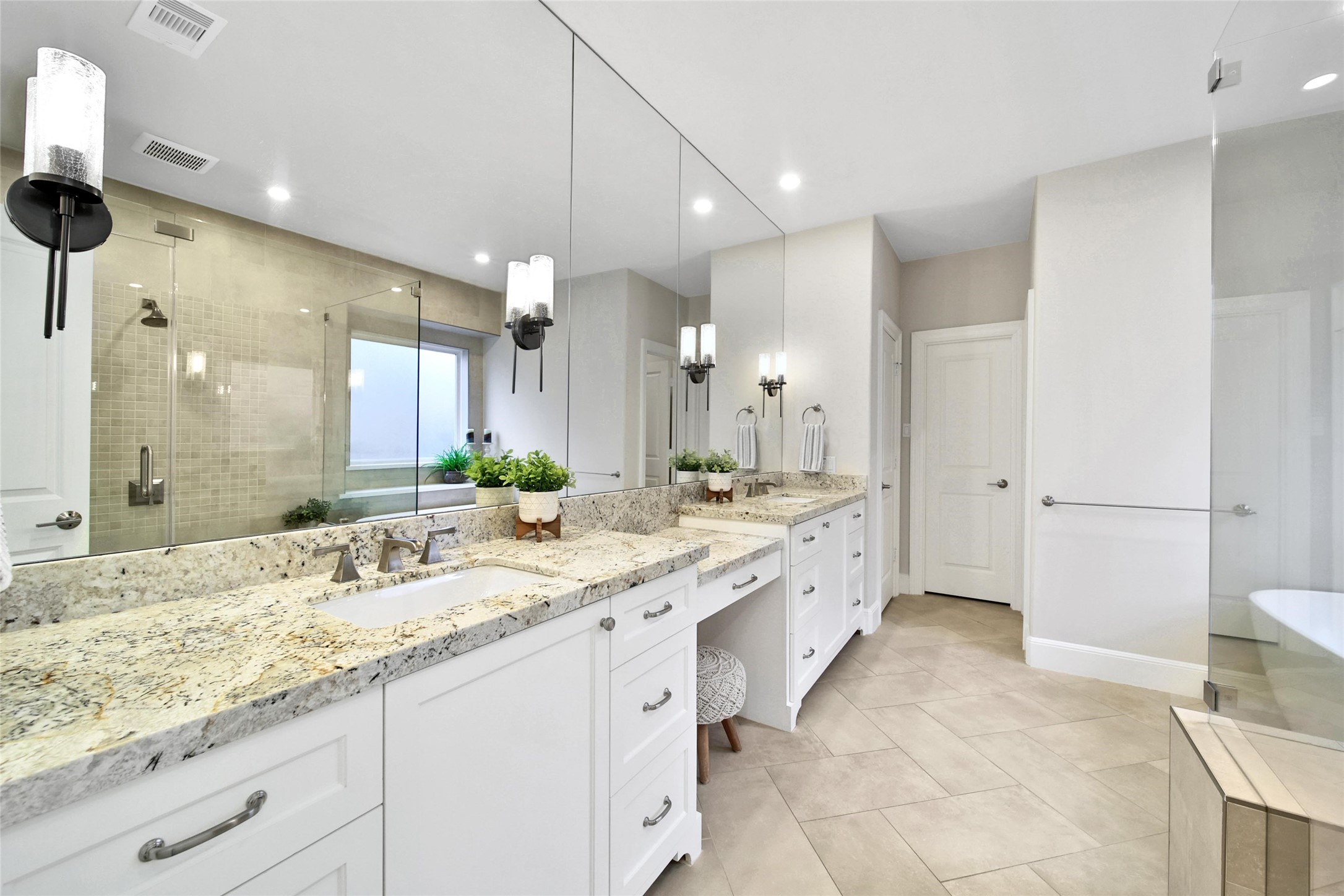 20730 Windrose Bend Drive Spring, TX 77379 - Photo 18 of 45 a large bathroom with a granite countertop sink mirror and a shower