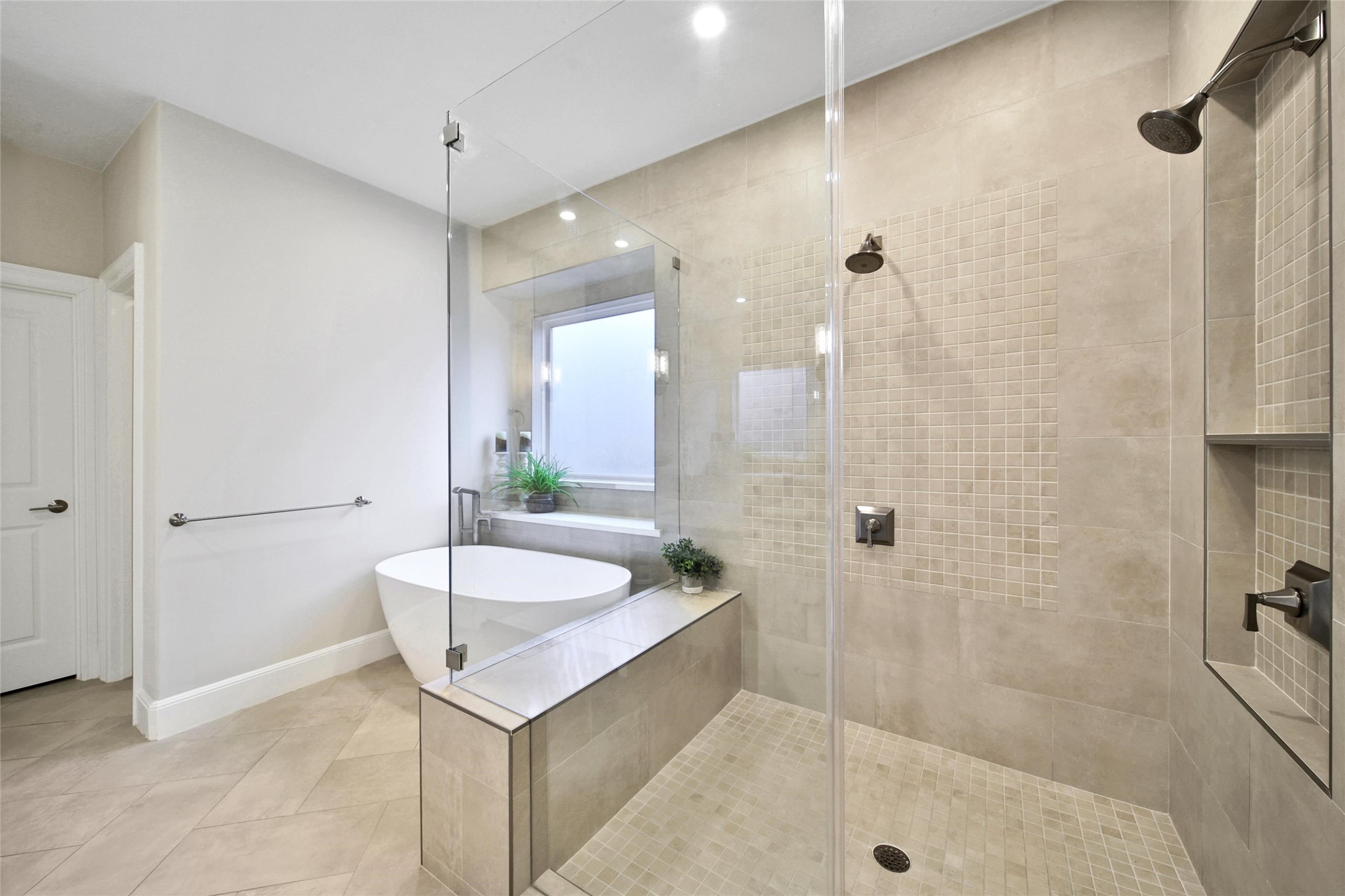 20730 Windrose Bend Drive Spring, TX 77379 - Photo 20 of 45 a spacious bathroom with a shower and a sink
