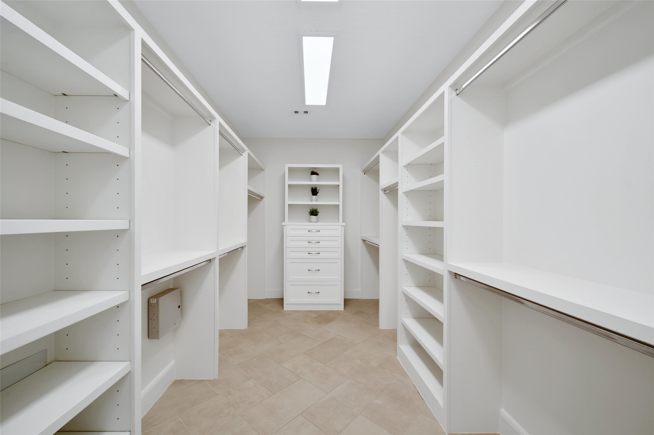 20730 Windrose Bend Drive Spring, TX 77379 - Photo 22 of 45 a view of walk in closet with empty racks