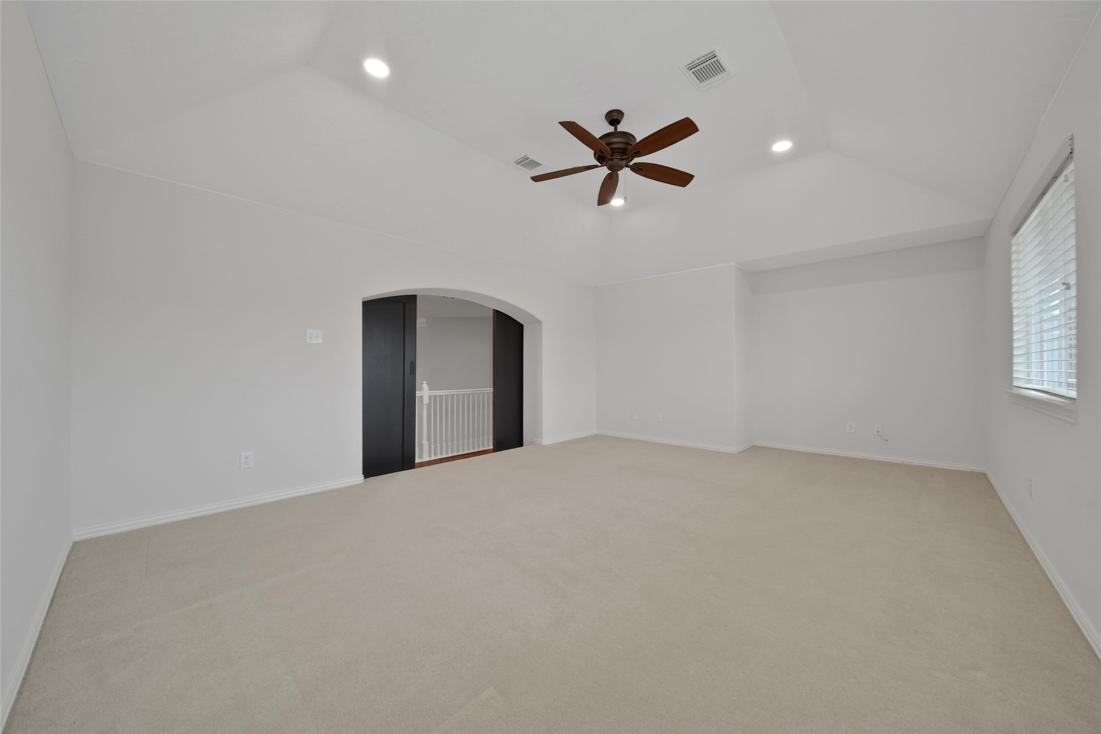 20730 Windrose Bend Drive Spring, TX 77379 - Photo 27 of 45 a view of a livingroom with a ceiling fan and window