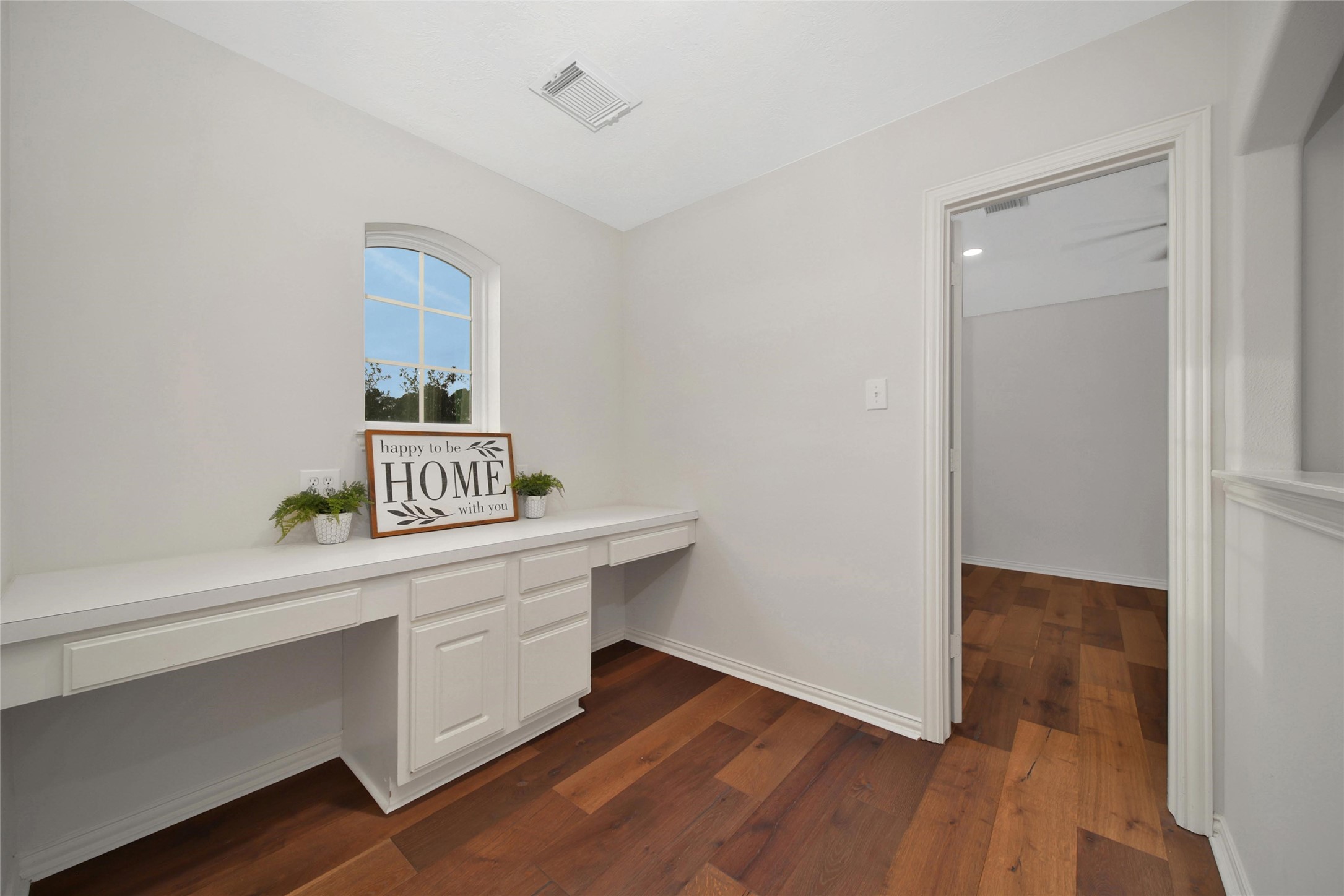 20730 Windrose Bend Drive Spring, TX 77379 - Photo 31 of 45 a room with wooden floor and white walls