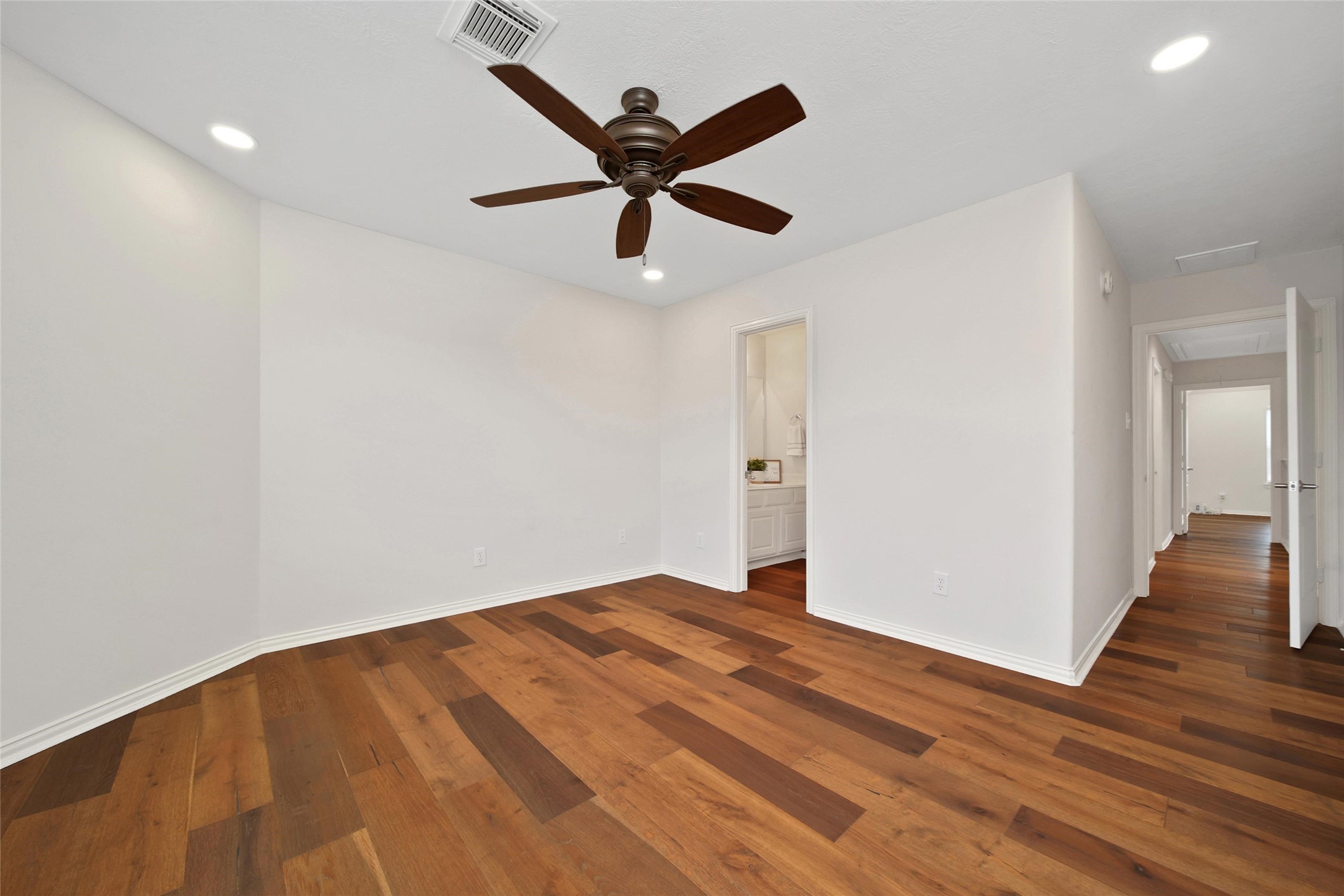 20730 Windrose Bend Drive Spring, TX 77379 - Photo 34 of 45 a view of empty room with wooden floor