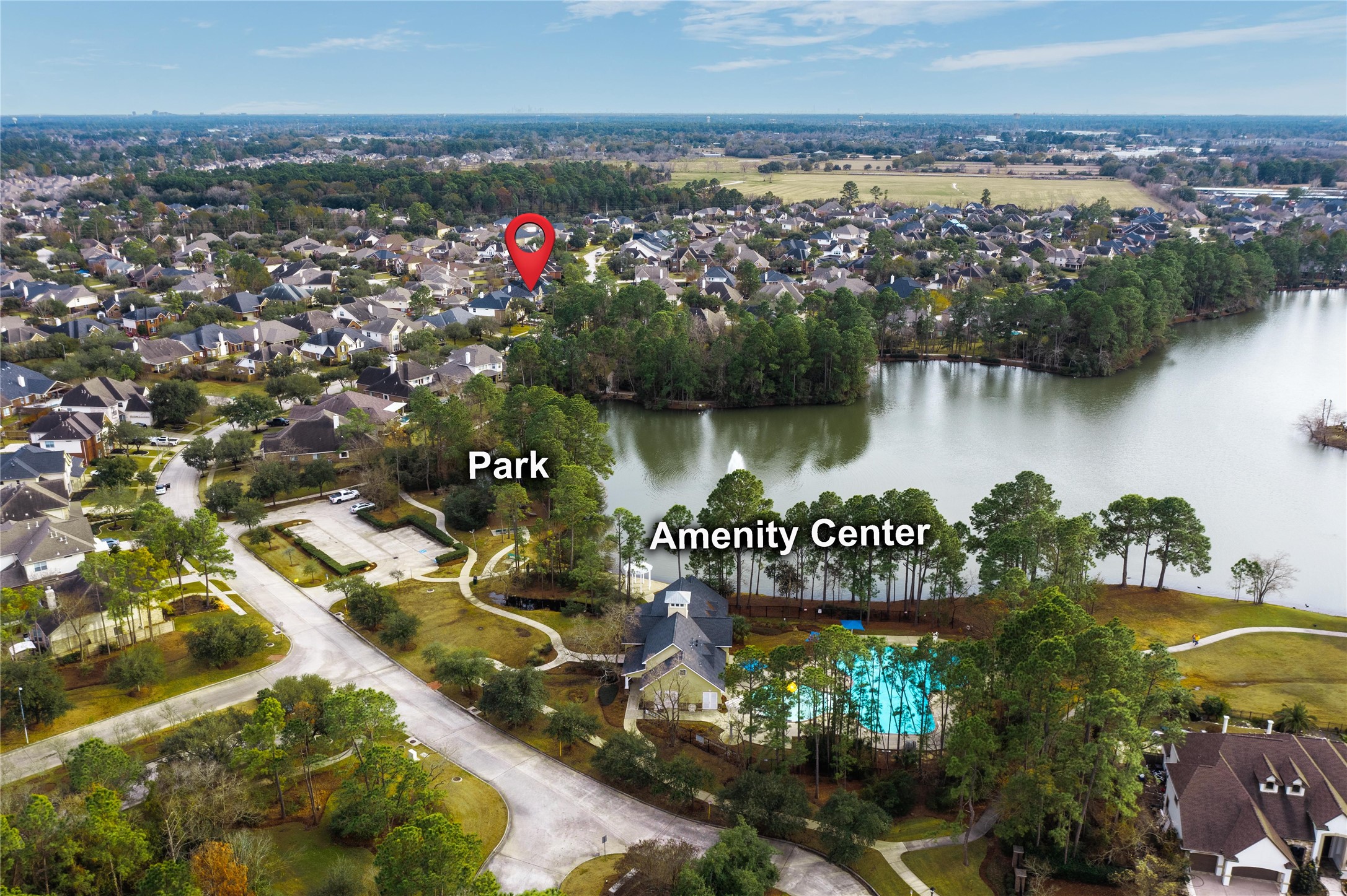 20730 Windrose Bend Drive Spring, TX 77379 - Photo 44 of 45 an aerial view of a house with a garden and lake view