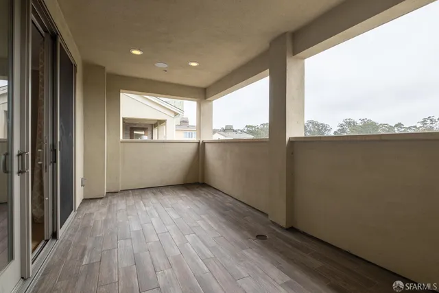 a view of entryway with wooden floor