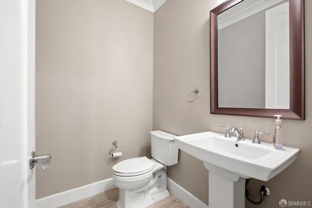 a bathroom with a sink and a toilet