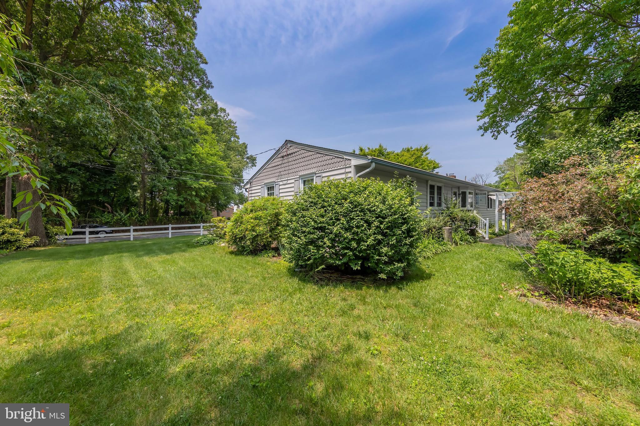 107 Elm Avenue Pitman, NJ 08071 - Photo 11 of 21 a view of a garden with a house