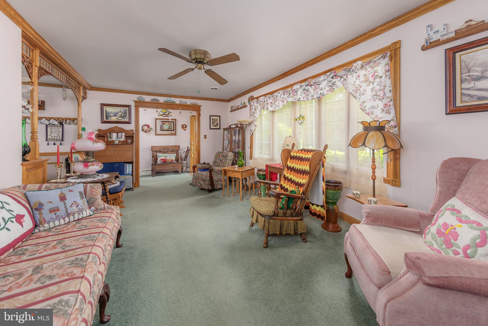 107 Elm Avenue Pitman, NJ 08071 - Photo 12 of 21 a living room with furniture and a large window