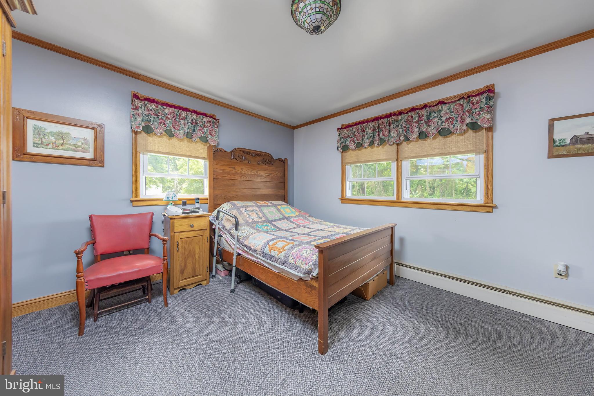 107 Elm Avenue Pitman, NJ 08071 - Photo 17 of 21 a bedroom with a bed and a window