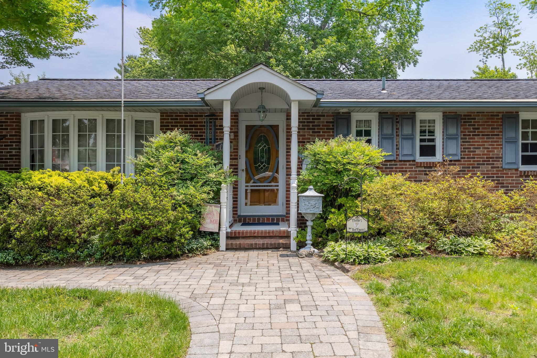 107 Elm Avenue Pitman, NJ 08071 - Photo 4 of 21 a front view of a house with garden