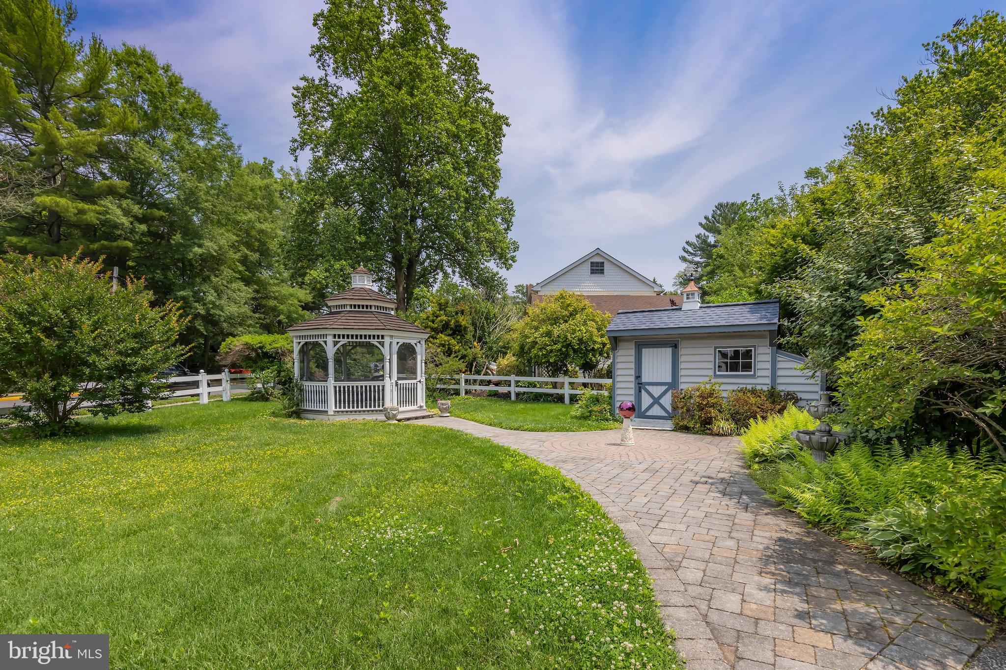 107 Elm Avenue Pitman, NJ 08071 - Photo 7 of 21 a front view of a house with a garden