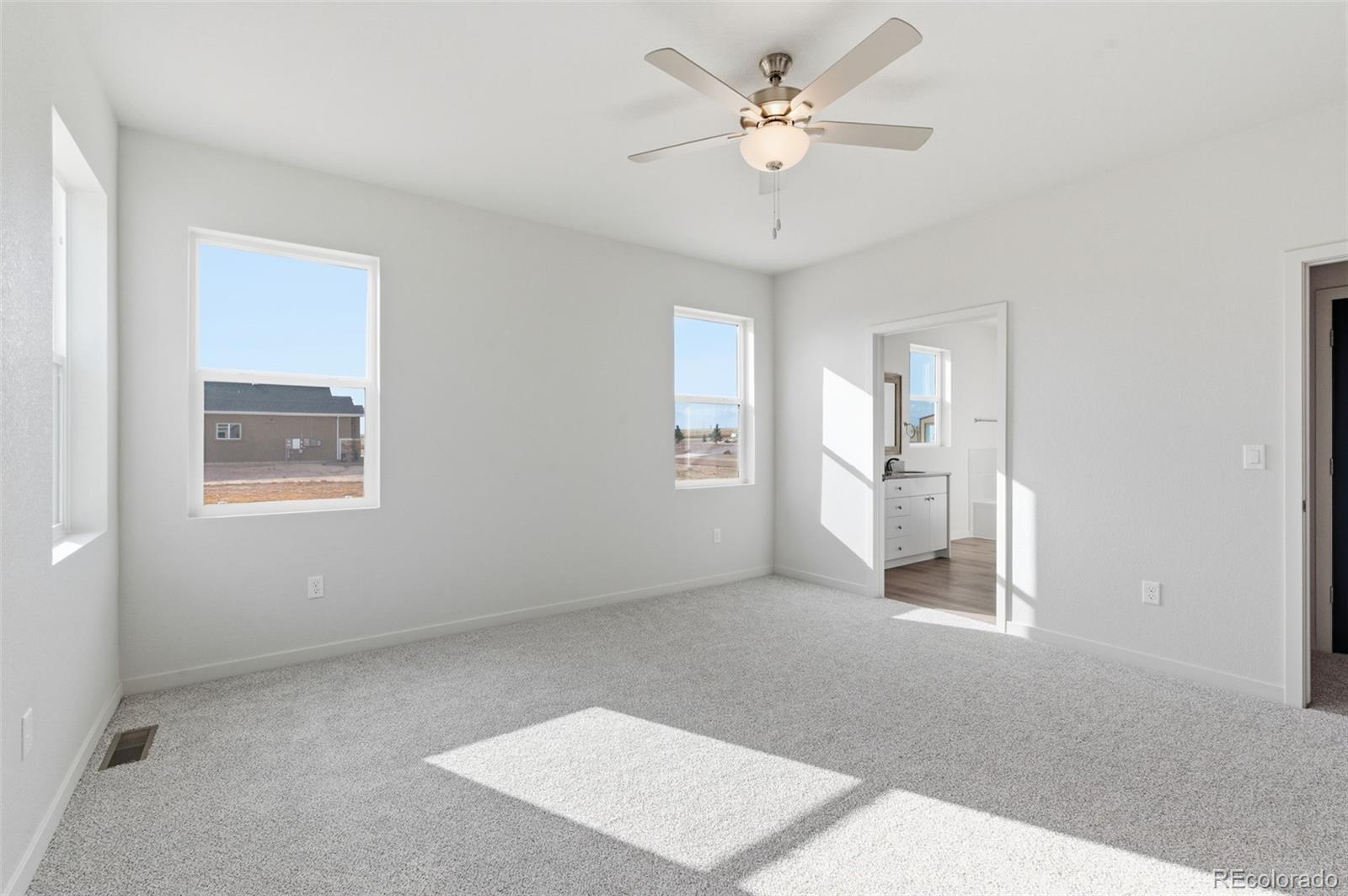 24515 Big Springs Road Peyton, CO 80831 - Photo 16 of 30 a view of an empty room with a window