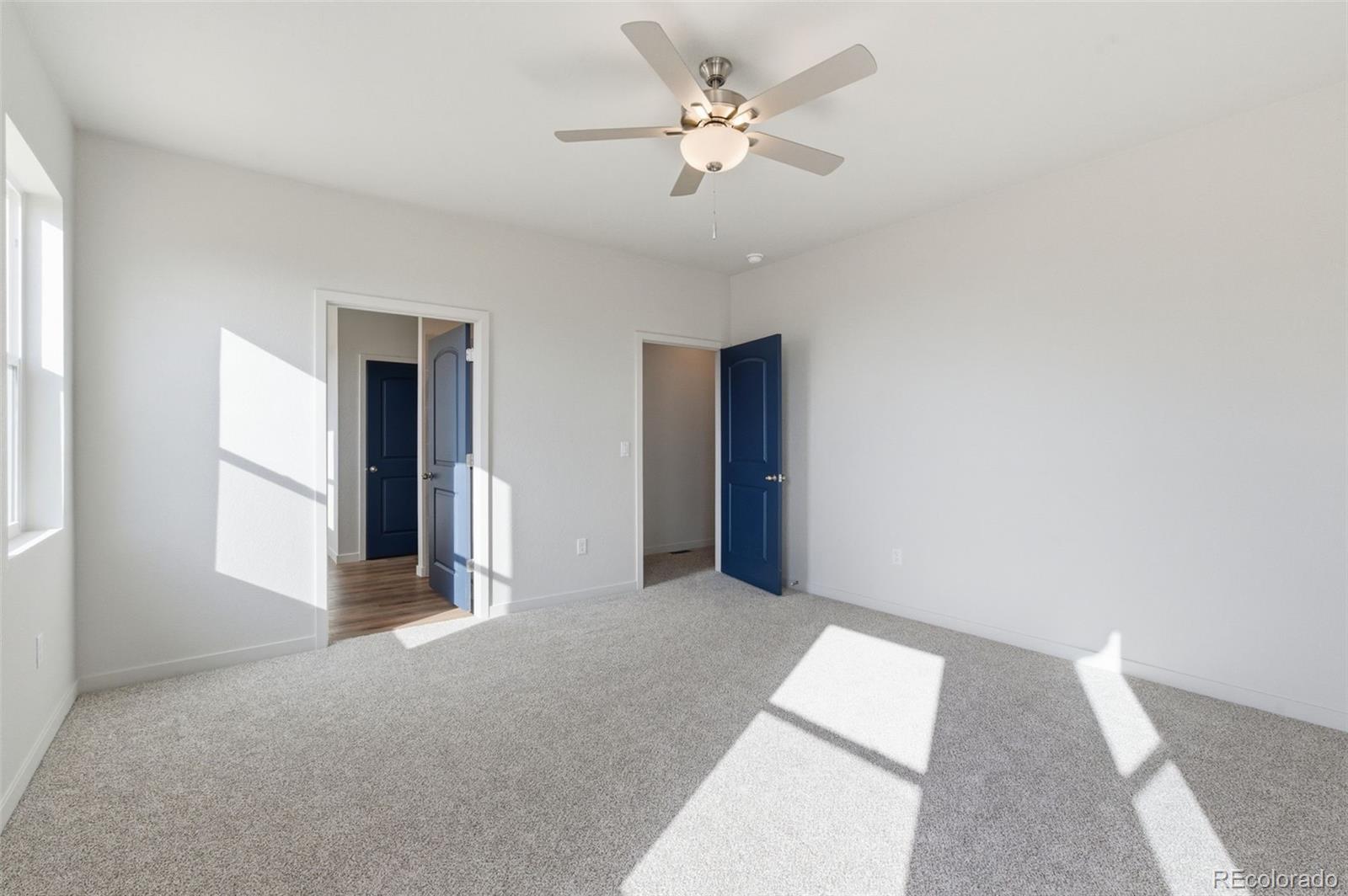 24515 Big Springs Road Peyton, CO 80831 - Photo 17 of 30 a view of an empty room with a window