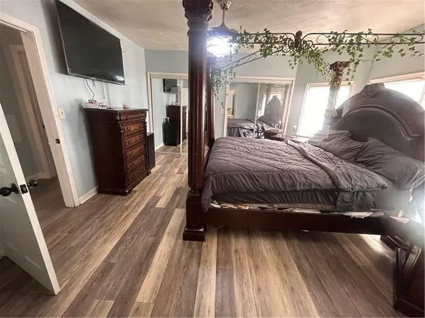 a bathroom with a sink and a window