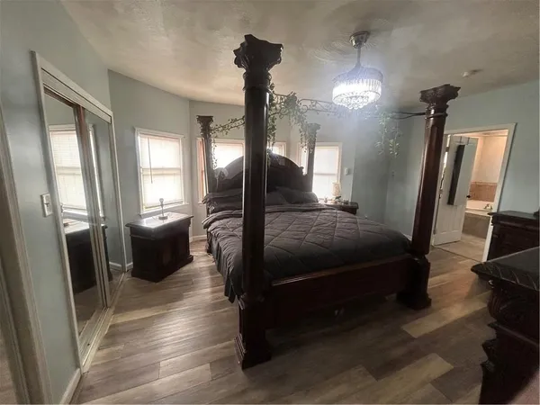 a bathroom with a sink toilet and mirror