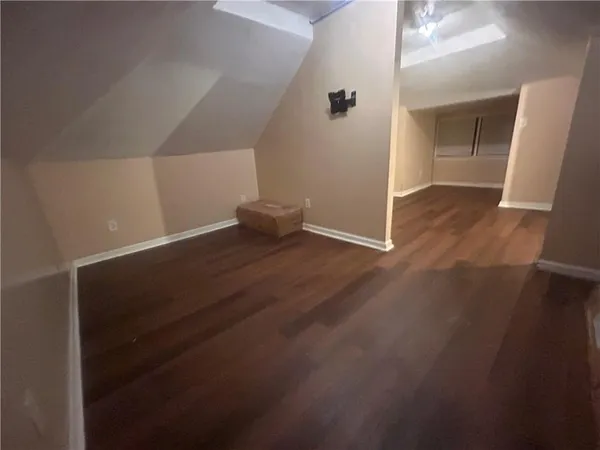 a view of a backyard with sitting area