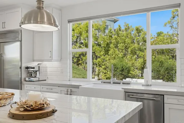 a view of a roof deck with couches