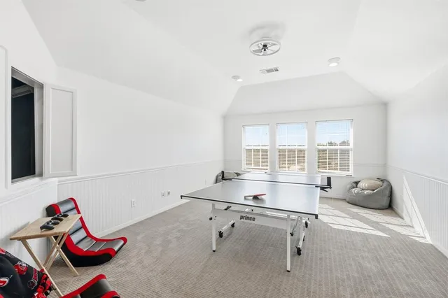 a bedroom with a bed and cabinets