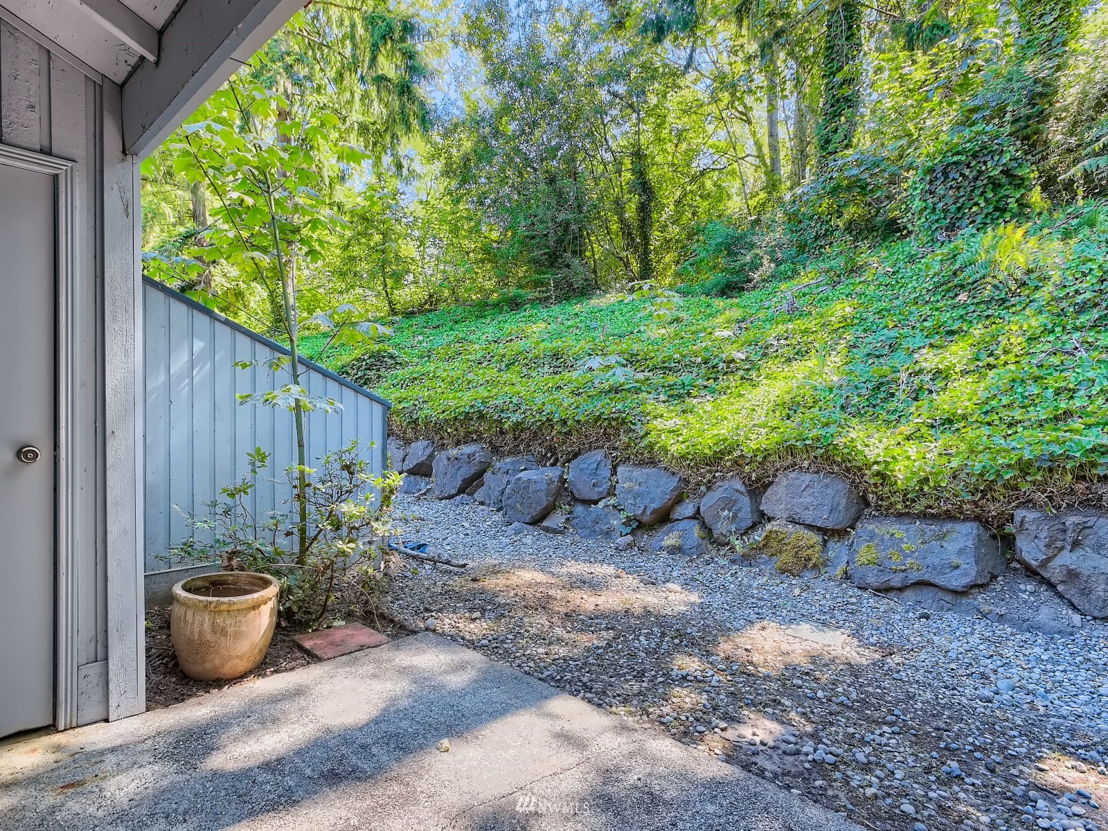 11521 Southeast 175th Street Renton, WA 98058 - Photo 12 of 20 a view of a backyard with patio
