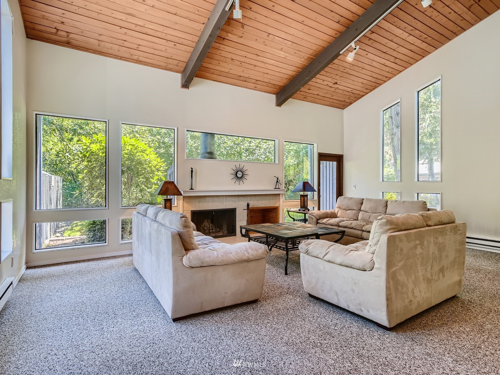 11521 Southeast 175th Street Renton, WA 98058 - Photo 15 of 20 a living room with furniture and a fireplace